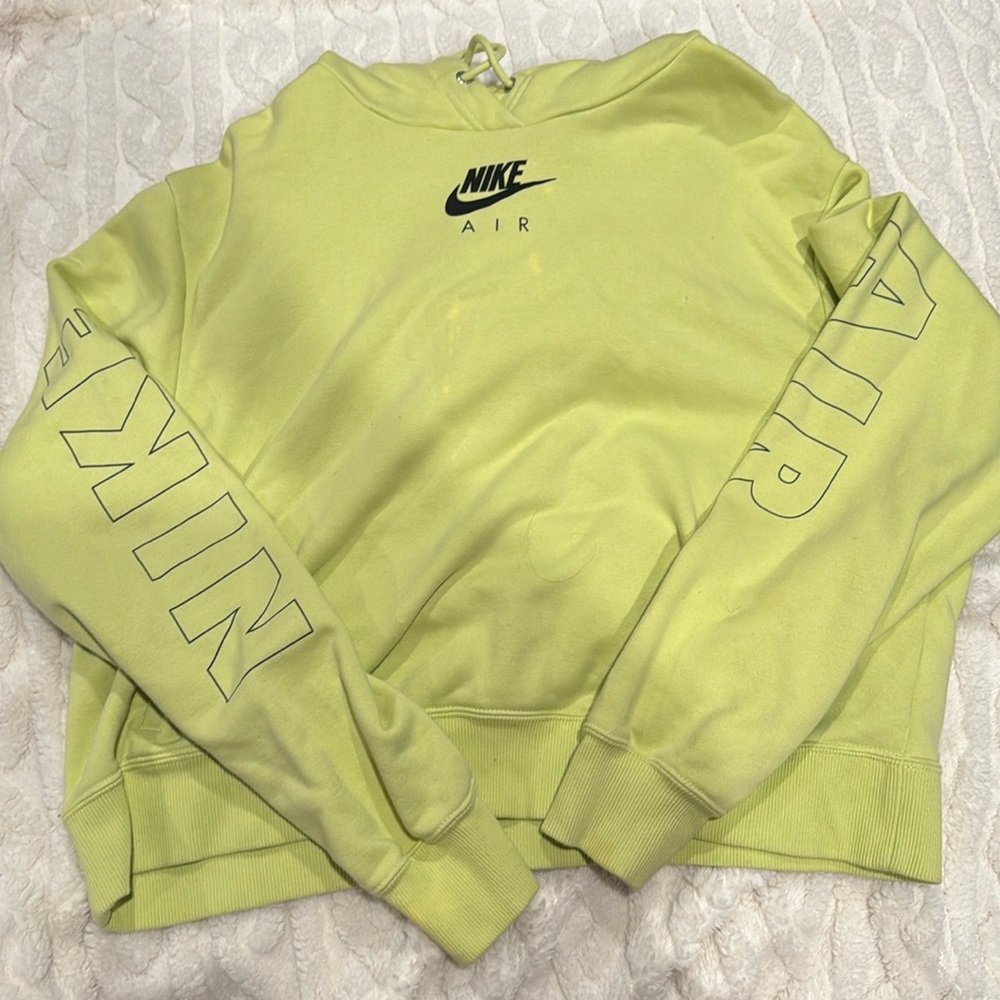 Green Nike sweatshirt, a couple bleach stains